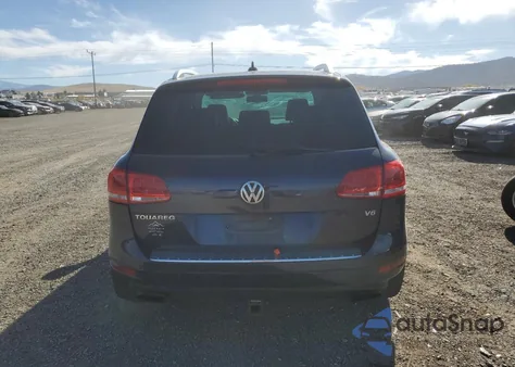 2012 Volkswagen Touareg V6 z USA, uszkodzony, nr VIN WVGFF9BP0CD000211